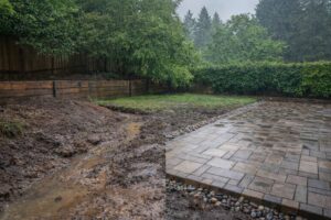 Paver patio and hardscape installation in a backyard remodel project in Oregon